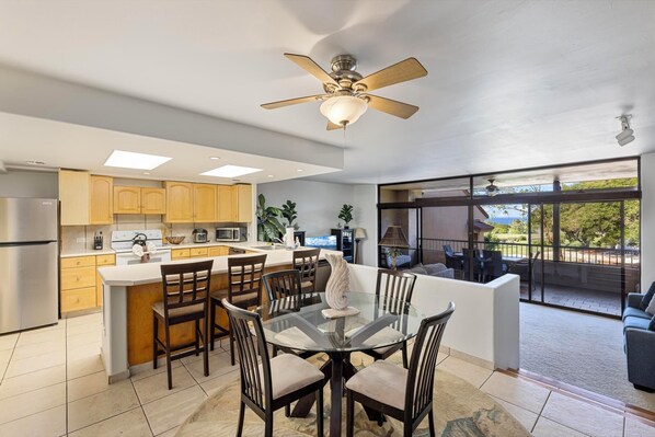 Prepare meals in the fully equipped kitchen and enjoy them in the dining area with a seamless flow to the living space.