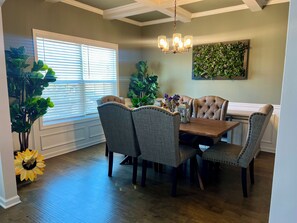 100% wood dining table with live edges, seats  6 w/ four extra chairs available 