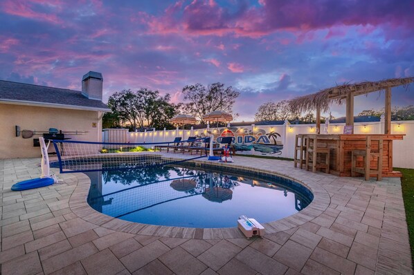 Our backyard comes alive at night—glowing lights, a perfect ambiance for relaxation and fun. 