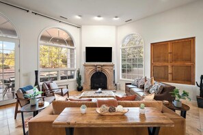 A warm and welcoming space to unwind, complete with a beautiful indoor fireplace. 