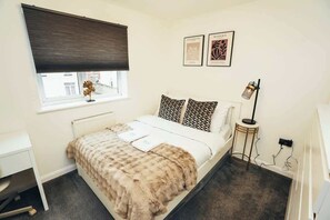 Relax and recharge in this stylishly designed bedroom
