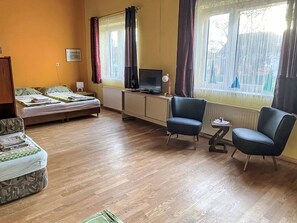 Flooring, Furniture, Floor, Interior Design, Room, Wood Flooring, Living Room, Bed, Hardwood, Curtain