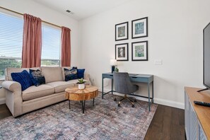 You'll love our comfortable (new!) Arhaus sofa in the living room - and the desk/office chair - perfect for WFH!