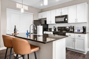Modern kitchen fully stocked for long stays