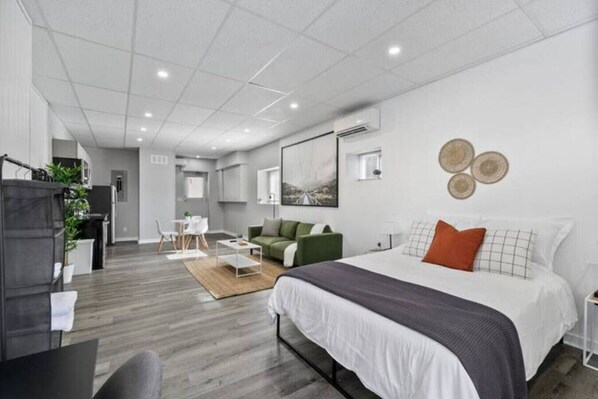 Spacious bedroom with stylish decor, perfect for unwinding after a day of exploring the local area.