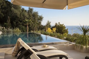 Patio with infinity heated pool, private garden, sun loungers and sea view in Luxury Rental Villa Energy Orebic - Peljesac 