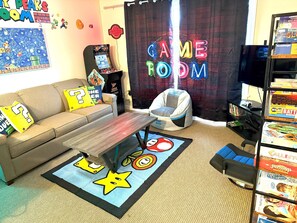 Xbox One, Mega Board Game Library, Gaming Chairs, Video Game, and More!  And the Couch opens to a Queen Sofa Bed to accommodate the whole family!
