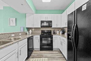 Gourmet Kitchen with All of your Cooking and Cleaning Needs