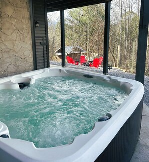 Private 7 person hot tub located on the lower level patio. 