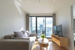Spacious living room, TV, sofa, balcony, smart TV