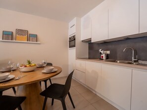 Interior Design, Flooring, Furniture, Countertop, Kitchen, Wood, Floor, Ceiling, Cabinetry, Room
