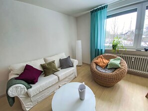 Furniture, Interior Design, Flooring, Floor, Wood, Couch, Room, Textile, Lighting, Living Room