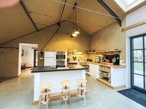 Ceiling, Flooring, Interior Design, Kitchen, Furniture, Floor, Light Fixture, Kitchen Appliance, Room, Countertop