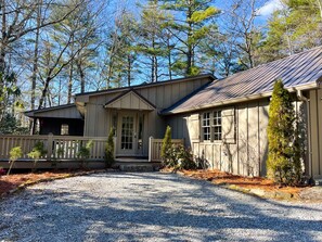Private Exterior with wooded views and porch