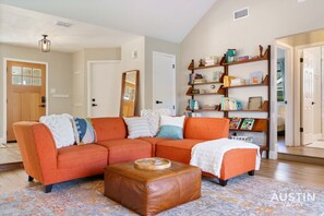From the plush seating to the warm ambiance, this living room is all about relaxation and great conversation. A perfect spot to gather with loved ones and make memories.
