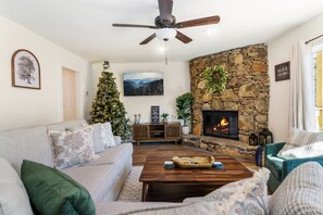Cozy up to the warm fire place and watch a movie on the large Smart TV