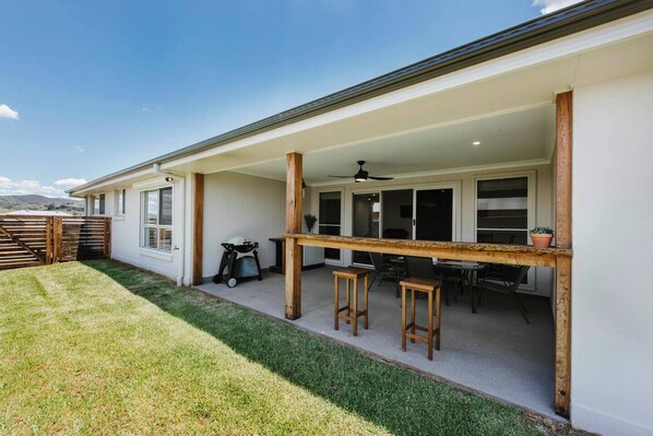 Make the most of the spacious alfresco area, featuring everything you need to entertain family and friends, including a BBQ, bar fridge and more.