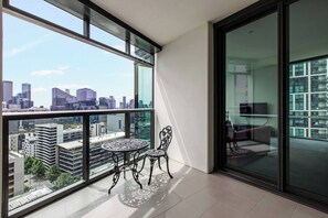 Step out onto the private balcony and enjoy the cityscape views while sipping your morning coffee or evening wine.