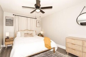 Queen Bed with touch lamps and memory foam mattress. 