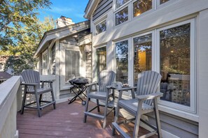 Sun porch with lagoon views and dining table for 4.