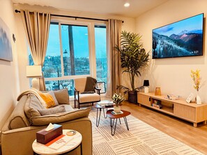 An elegant living room with curated decor, inviting comfort and style!
