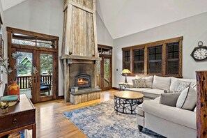 Living room with wood-burning fireplace
