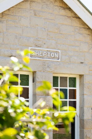 Shepton House has so much original charm including stained glass windows.