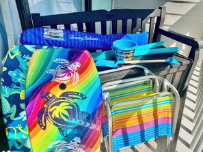 Beach and pool items are stored inside the bench on the balcony for our guests.