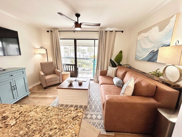 Couch opens into a queen size sleeper. Linens located inside the coffee table. 