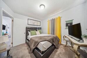 Slip into the cozy queen bed and catch a movie on the Smart TV.