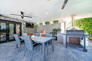 BBQ + Pizza Oven + Outdoor Dining Table + Smart TV