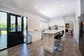 Kitchen + Coffee Machine + Breakfast Bar & Stools