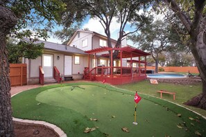 Bring your A-game! Our backyard features both putt-putt and corn hole for endless outdoor entertainment.
