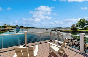 Experience tranquility with stunning waterfront views from our deck—your perfect spot for morning coffee or evening sunsets!