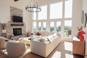 The living room has a gorgeous fireplace perfect for curling up after a long day of exploring! 