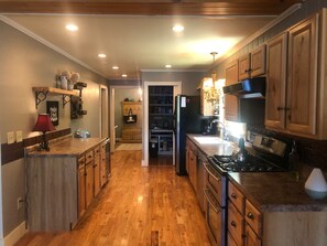 Full kitchen with chef pantry