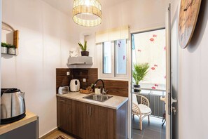 Discover the kitchen area, a space designed for both functionality and style