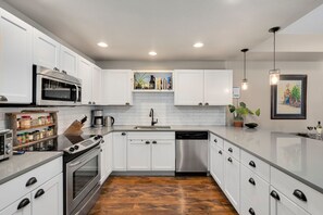 Fully-equipped Kitchen | Breakfast Bar with Seating for 4!
