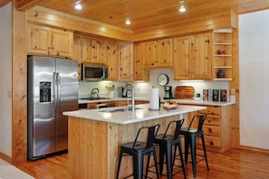 Indoors, Hardwood, Kitchen, Refrigerator, Microwave