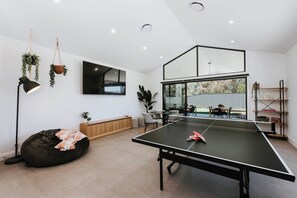 There are plenty of books and games throughout the property, along with a ping pong table.