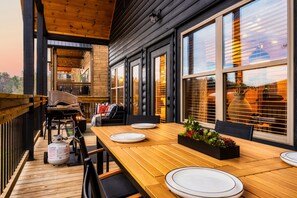 Outdoor dining area on upper deck