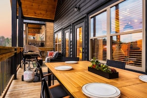 Outdoor dining area on upper deck
