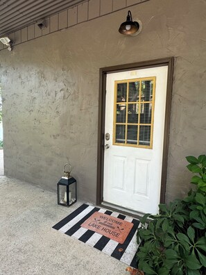 Front door where you enter your personal door code
