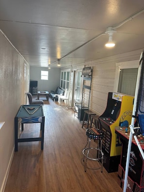 Also in the Gameroom are couple arcades, pool table, and a sitting lounge