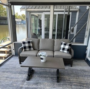 Couch and Coffee Table On screened porch