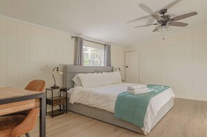 Enjoy a restful night's sleep in our stylish and comfortable bedroom. With soft linens, ample pillows, and a calming atmosphere, you'll wake up feeling refreshed and ready to explore. #bedroomdesign #comfort #stylishstay #getaway

