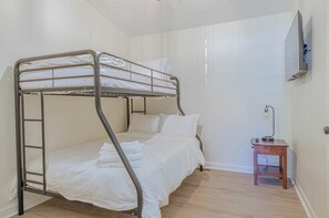 Perfect for families or groups traveling together, this room offers comfortable bunk beds for a fun and memorable stay. #bunkbeds #familytravel #grouptravel #airbnb

