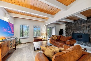 The downstairs living room is perfect for movie night on the 55 HDTV with plenty of seating