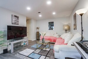 A spacious living room perfect for cozy nights and lively gatherings!