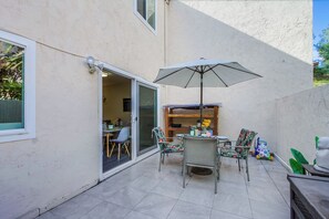 Relax and unwind on this charming balcony with stunning views.
